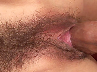 Slim Japanese slut has her bushy pussy spooned with vigor