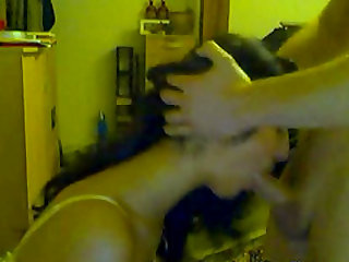 Dark haired milf sucks a long cock on the cam for fun